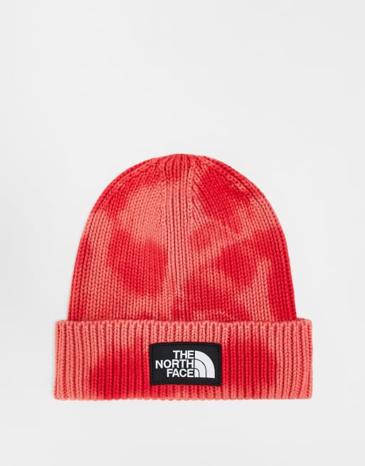 Gorro roja de efecto tie dye con vuelta y parche con el logo de