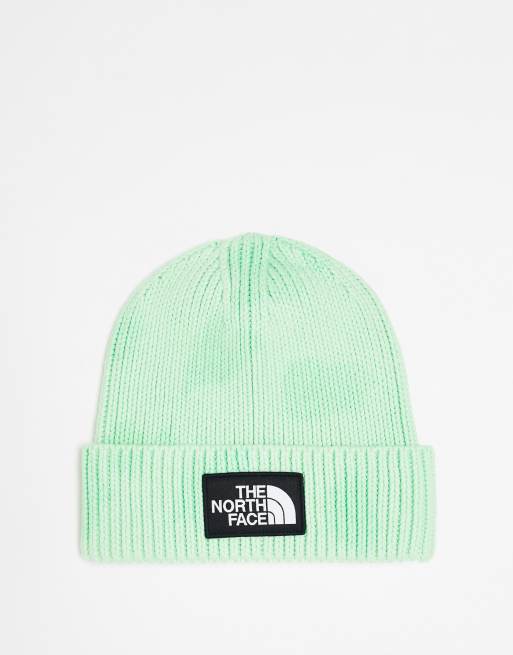 Gorro verde de efecto tie dye con vuelta y parche con el logo de The North Face