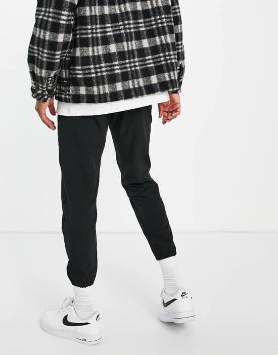 https://images.asos-media.com/products/gramicci-4-way-stretch-sweatpants-in-black/200735297-2?$n_550w$&wid=550&fit=constrain