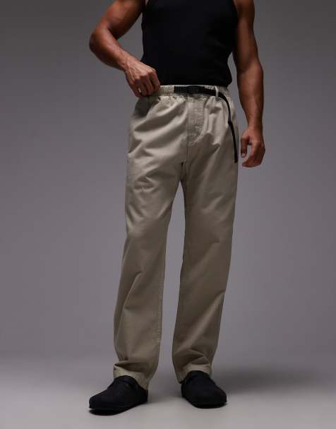 Gramicci G-pant tapered trousers in beige - view 1
