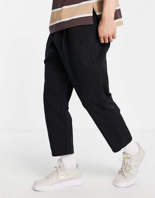 Gramicci loose tapered trousers in black | ASOS