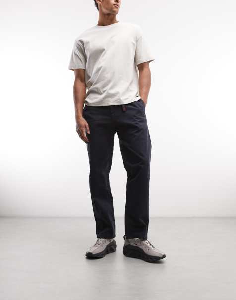 Gramicci tapered trousers in navy - view 1