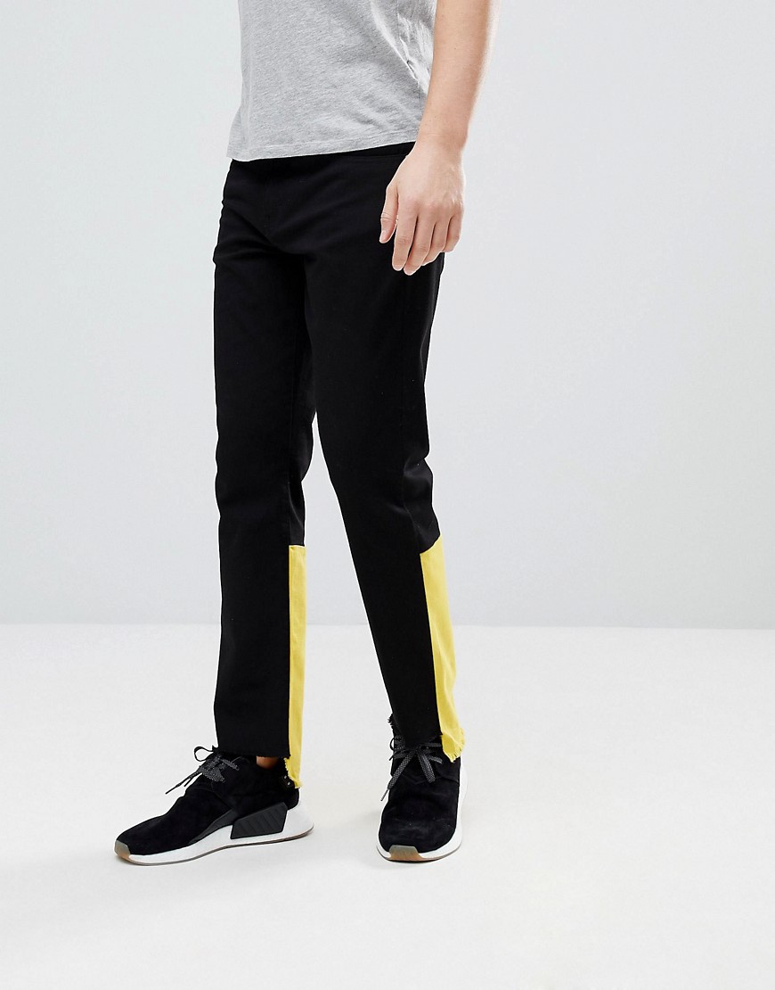 Granted - Jeans med  slitna kanter och kontrastpaneler-Svart