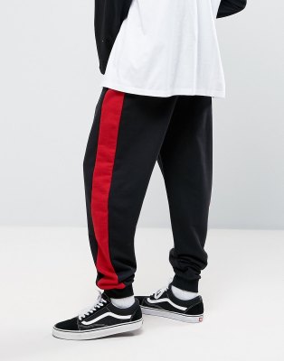 black joggers with red stripe