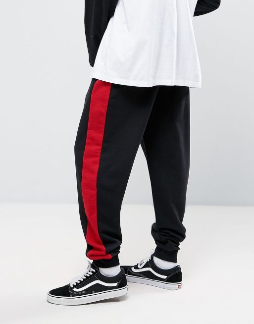 Red track pants hot sale with black stripe