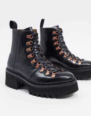 black and rose gold boots