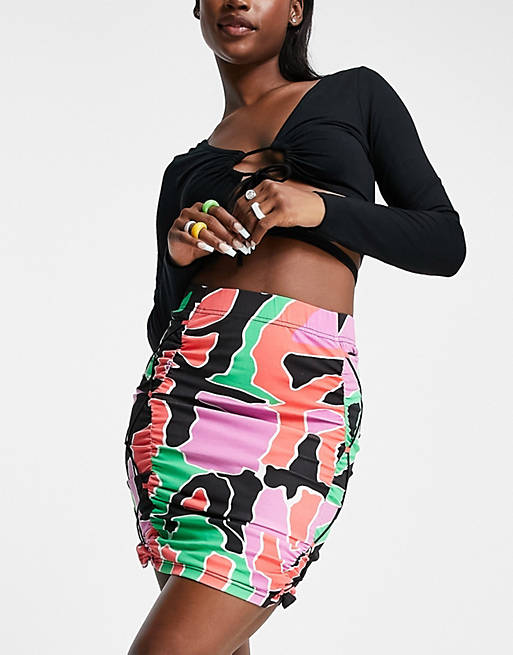 Grimey festival mini skirt with lace sides in bright print co-ord