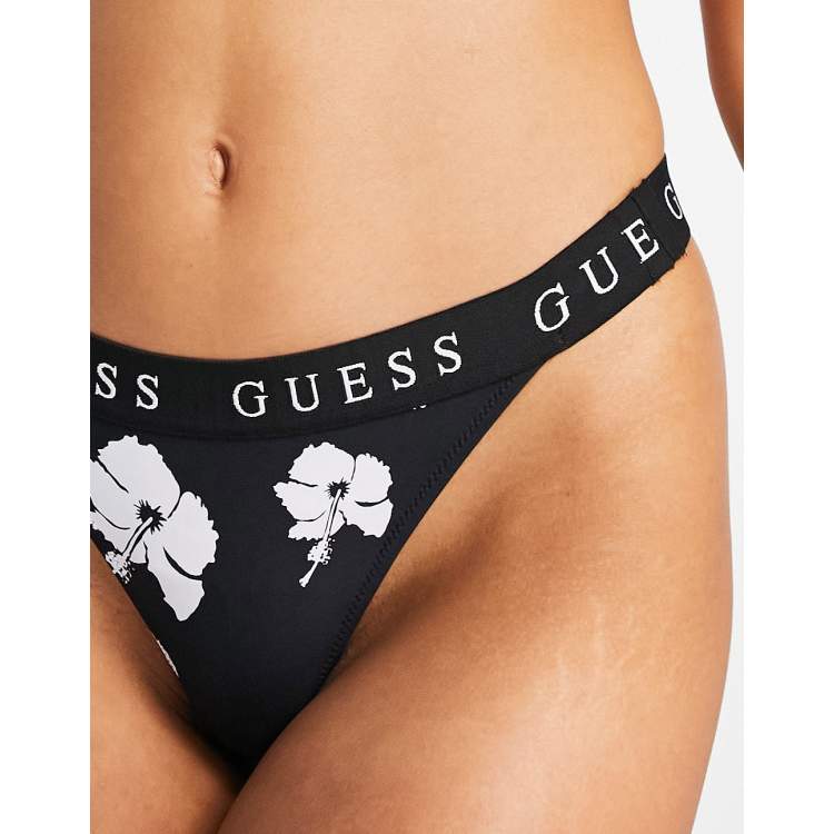 Guess Brazilian bikini bottoms in black floral | ASOS