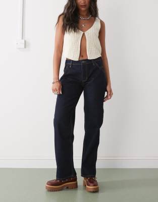carpenter denim jeans in indigo with logo back print-Blue