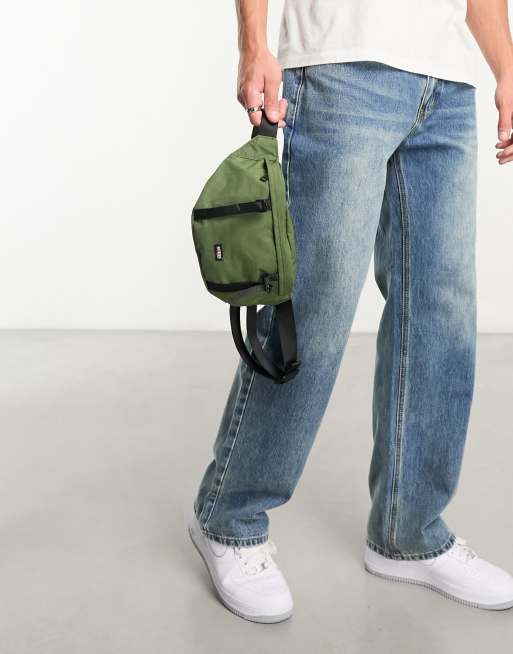 Guess Originals logo nylon fanny pack in green | ASOS