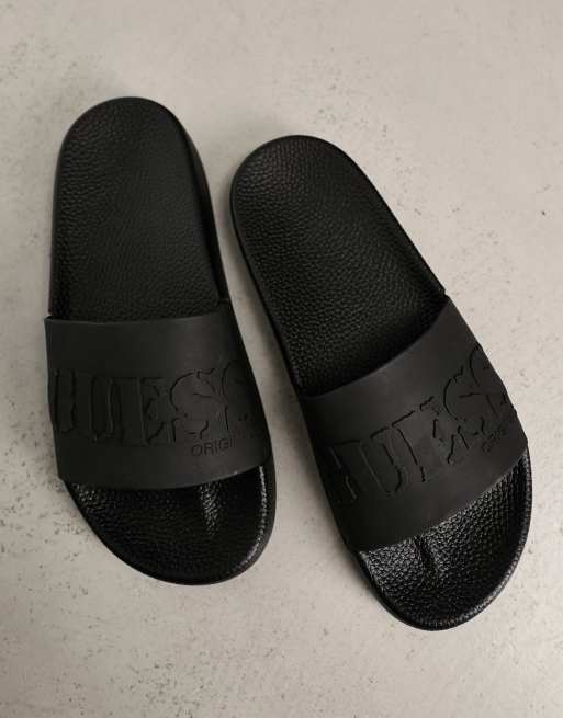 Guess logo store slides