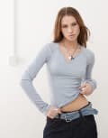 [Guess Originals] Guess Originals notch neck long sleeve ribbed top in light blue 12 Blue