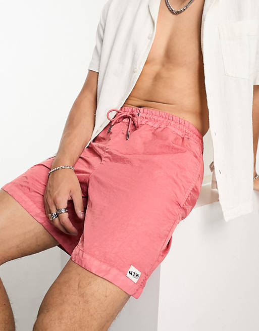 GUESS Originals washed nylon shorts in peach