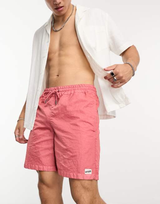 GUESS Originals washed nylon shorts in peach