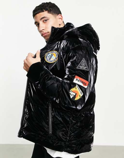 Guess shiny puffer jacket in black with badge logo ASOS