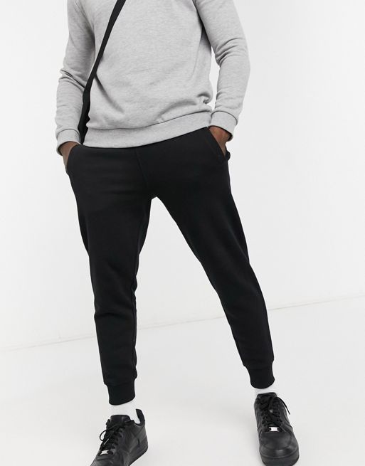 Guess skinny cuffed sweatpants in black with small logo | ASOS