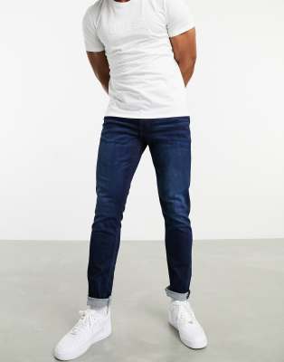 dark blue tapered jeans