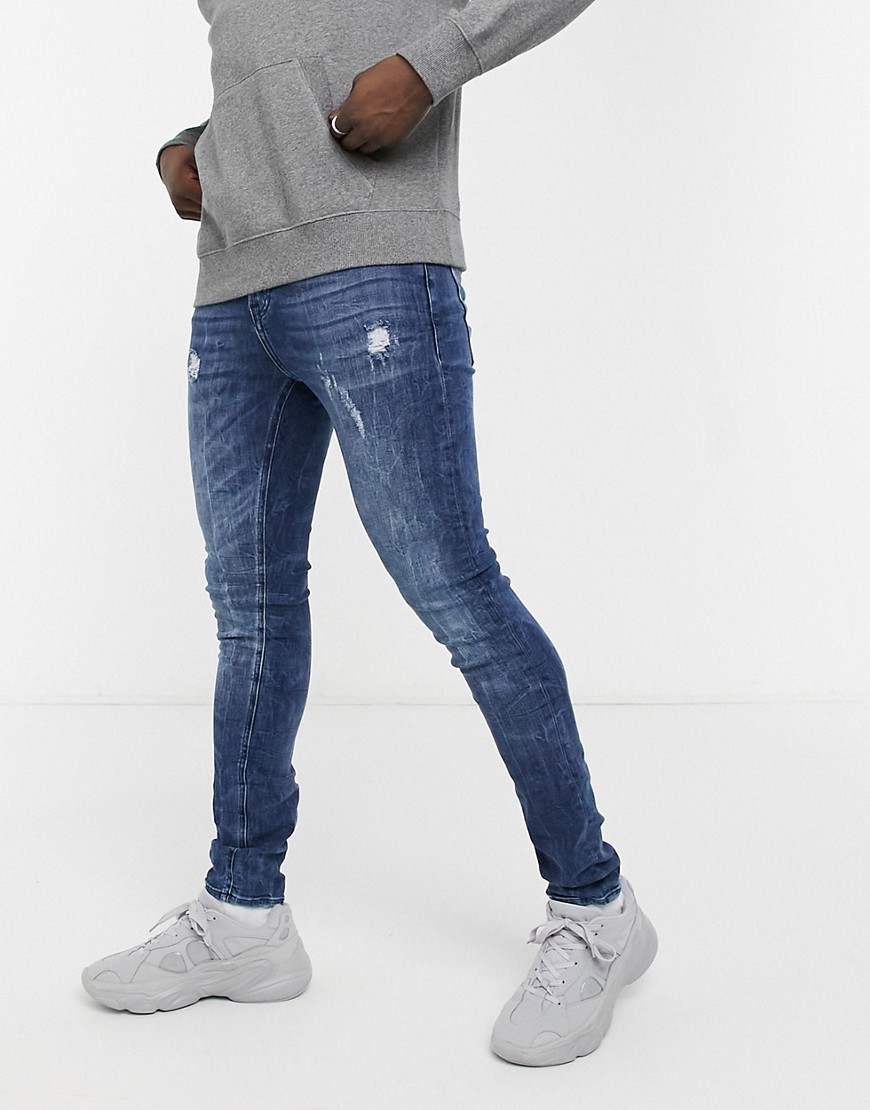 Guess super skinny jeans in mid wash with back logo-Blues