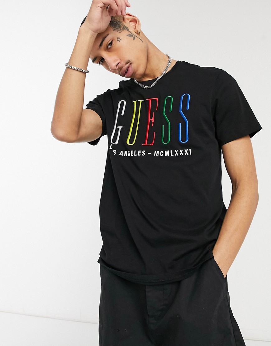 Guess t-shirt with multi chest logo in black