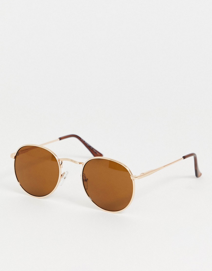 Guldfarvede runde solbriller fra AJ Morgan