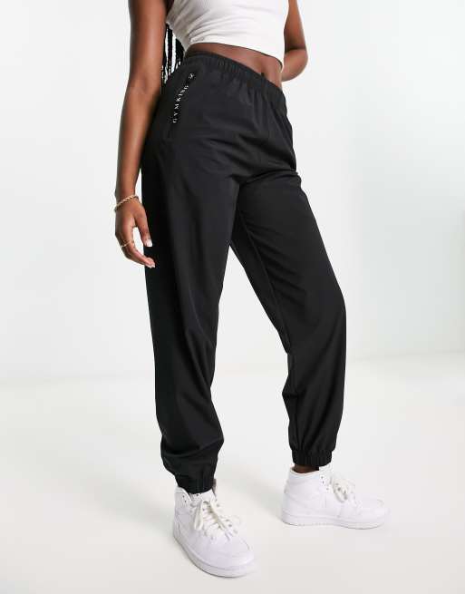 Gym King Linear Taped woven joggers in black | ASOS