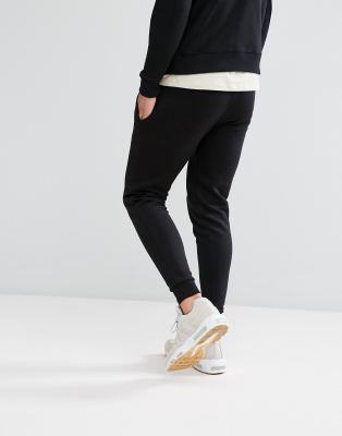 gym king black and gold joggers