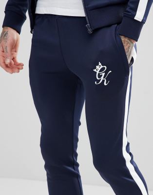 navy joggers with white stripe