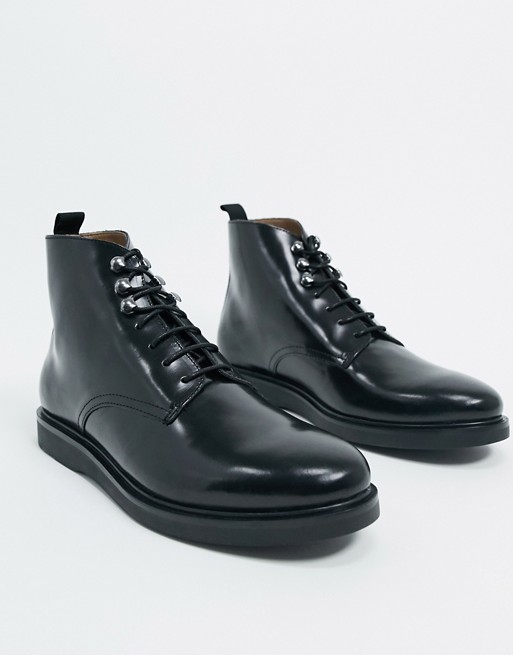 H by Hudson battle boots in black high shine leather