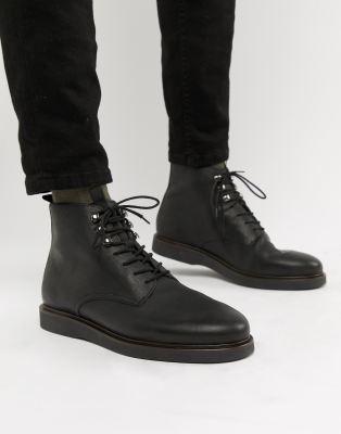 h by hudson battle lace up boots in black leather