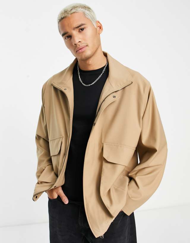 Harry Brown funnel neck oversized jacket in beige