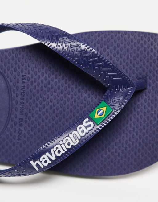 Havaianas Brazil Logo Flip Flop Sandals in White | UK