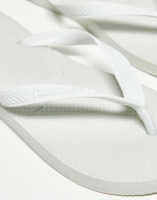 Havaianas Brasil Logo flip flops in blue and white