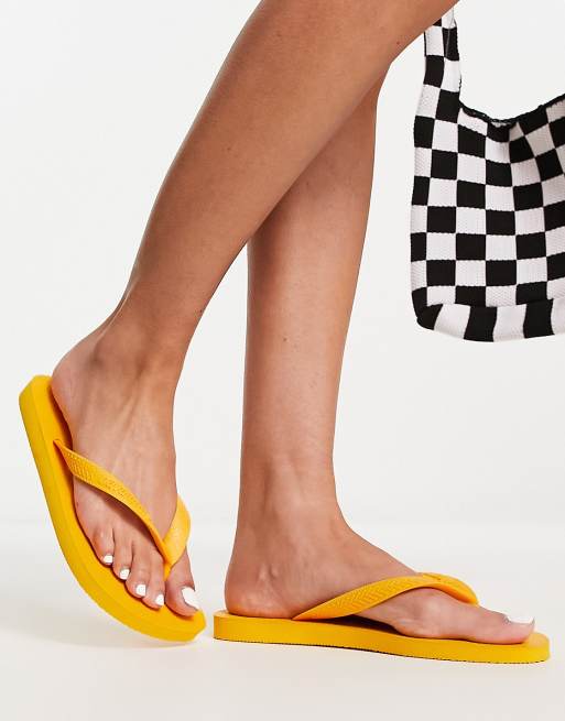 Havaianas Classic Top flip flops in yellow ASOS