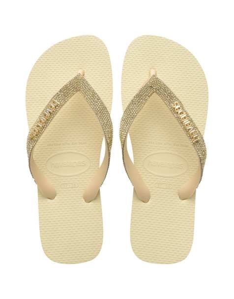 Havaianas embellished flip flops in cream - view 1