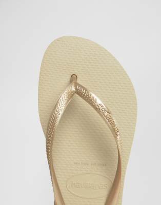 havaianas gold flip flops