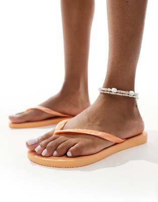 Havaianas - Schmale Zehenstegsandalen in Orange