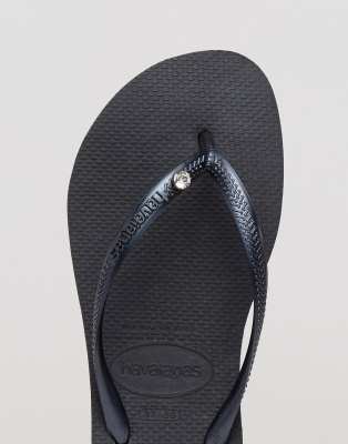 Havaianas slim crystal flip flops in black ASOS