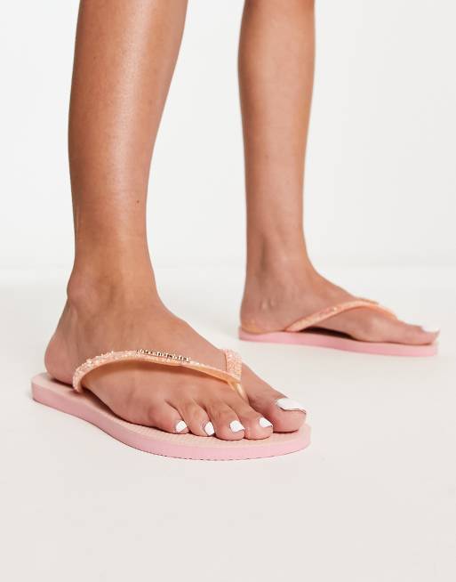 Havaianas Slim flip flops in pink glitter ASOS