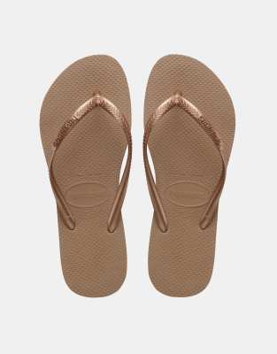Havaianas Slim Logo-embossed Rubber Flip Flops In Gold