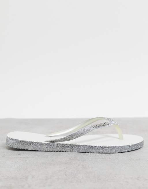 Silver sparkle flip flops hot sale