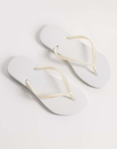 Havaianas slim flip flops in white - view 1