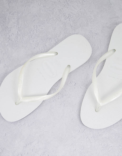  Flip Flops/Havaianas slim flip flops in white 