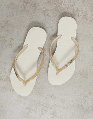 Met andere woorden Normalisatie hel Havaianas - Slim Glitter II - Teenslippers met glitter in beige | ASOS