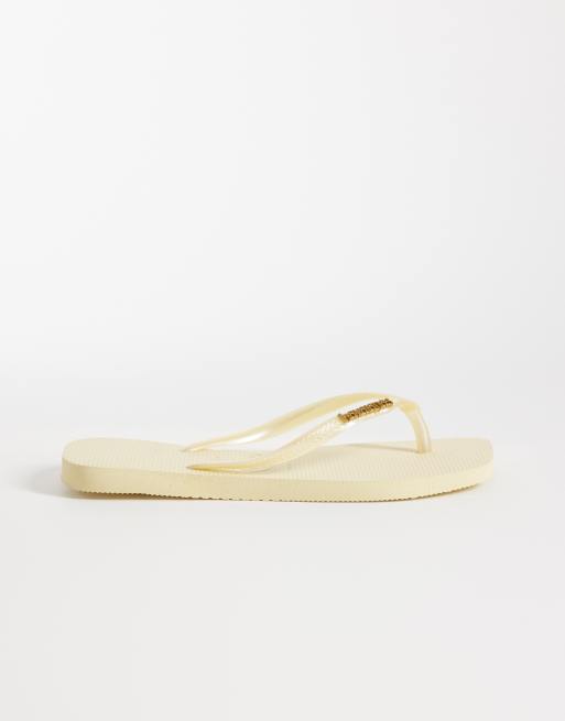 Havaianas slim square toe metallic logo flip flops in buttercream, 2 of 4