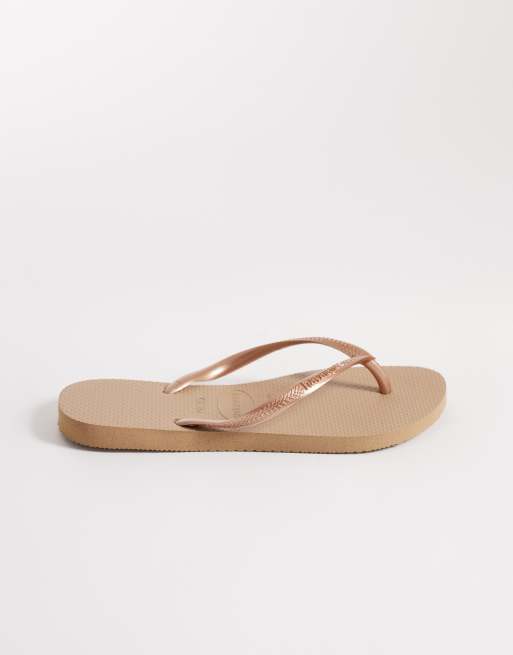 Havaianas - Smalle teenslippers in goud, 3 van 4
