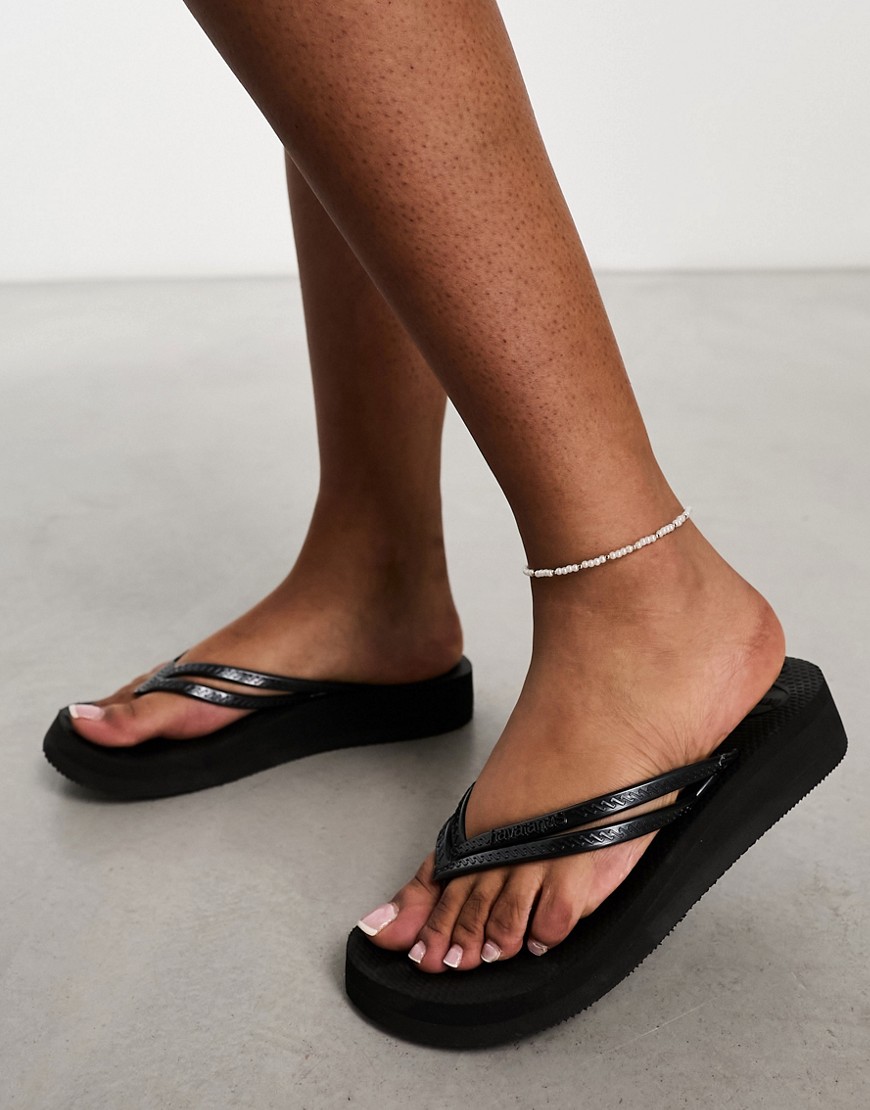havaianas - svarta sandaler med kilklackar-svart/a