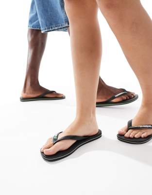 Havaianas - Unisex-Zehenstegsandalen in Schwarz mit brasilianischem Logo