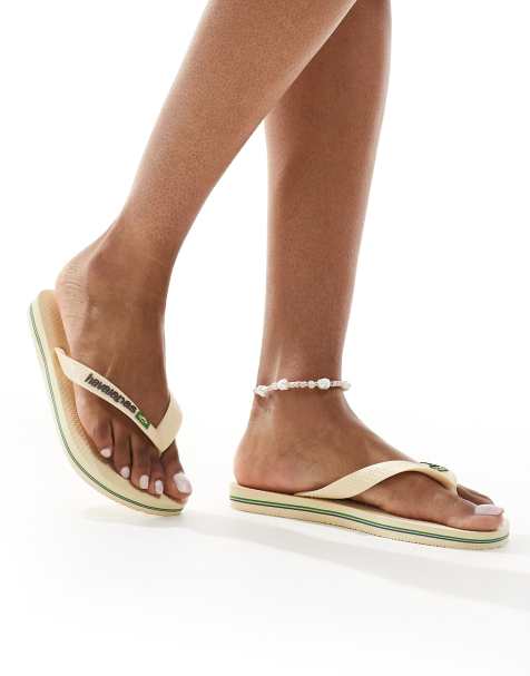 Havaianas – Zehenstegsandalen in Buttercremeweiß mit brasilianischem Logo - view 1