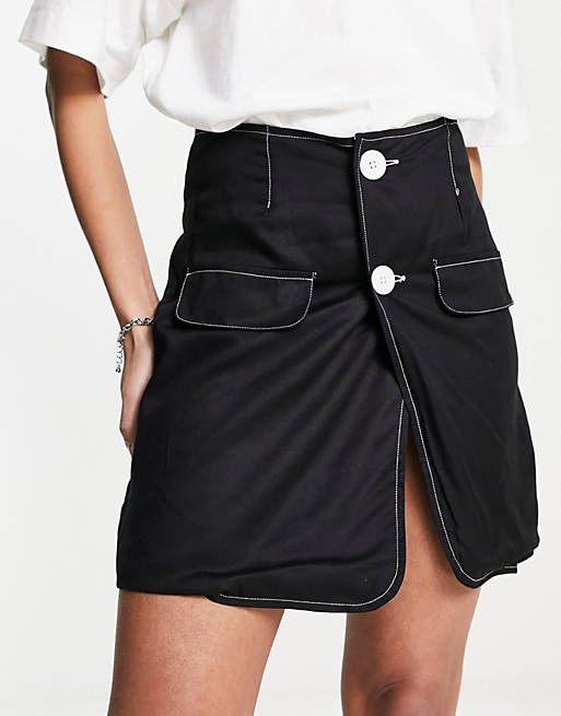 Heartbreak button front mini skirt with contrast stitch in black | ASOS