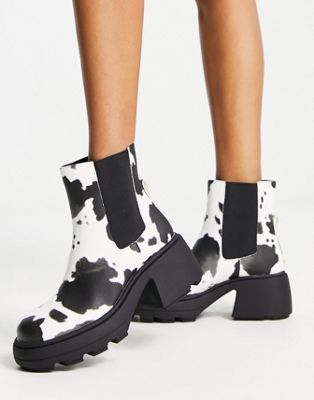  chunky heeled ankle boots in cow print